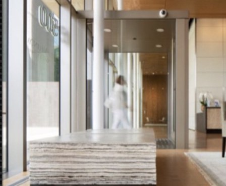 Reception lobby with travertine coffee table, Bill & Melinda Gates Foundation headquarters.